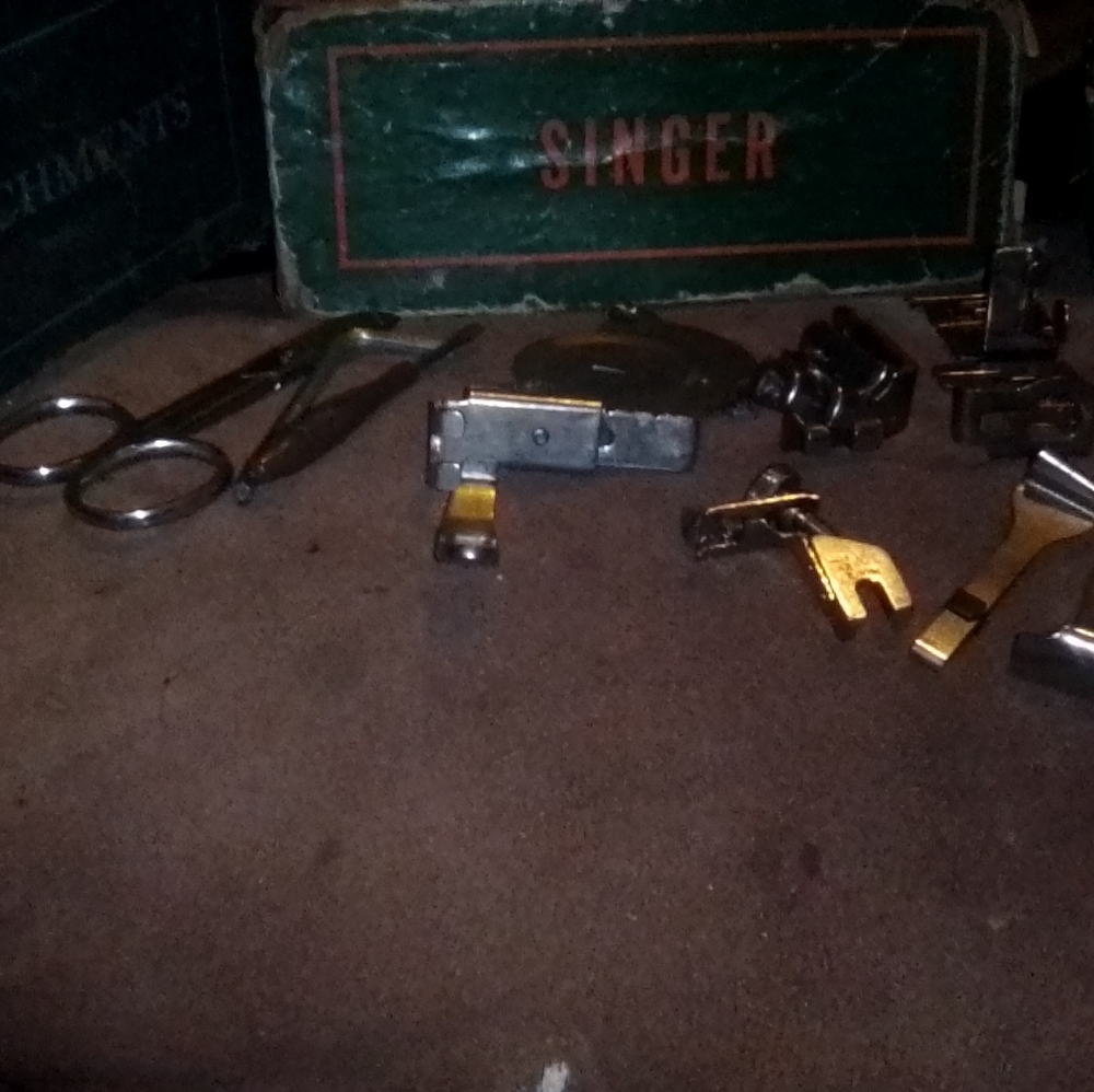 Vintage singer sewing machine attachments